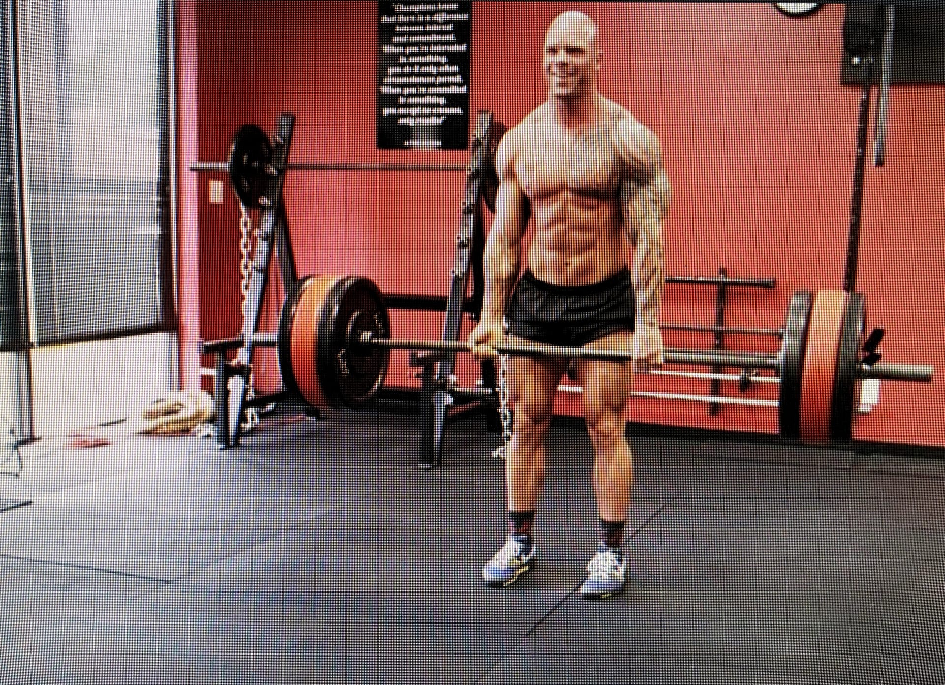 Garth Wotkyns training a client at Garth Wotkyns gym